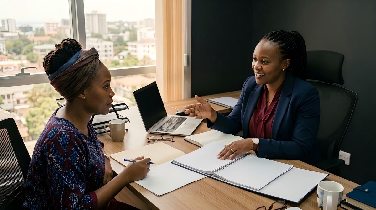 Wellbiz Solutions consultant reviewing business registration documents with a client